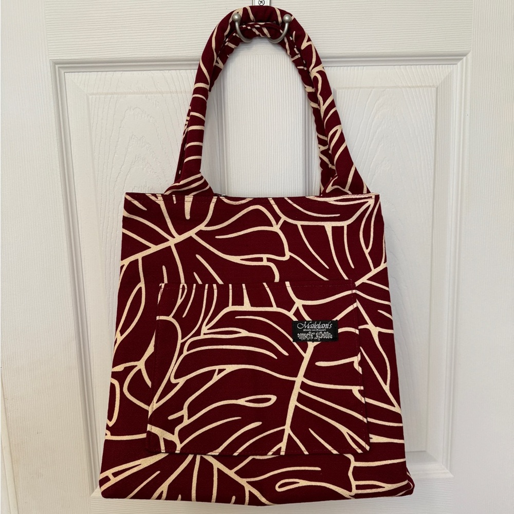 Hawaiian print hand bag
